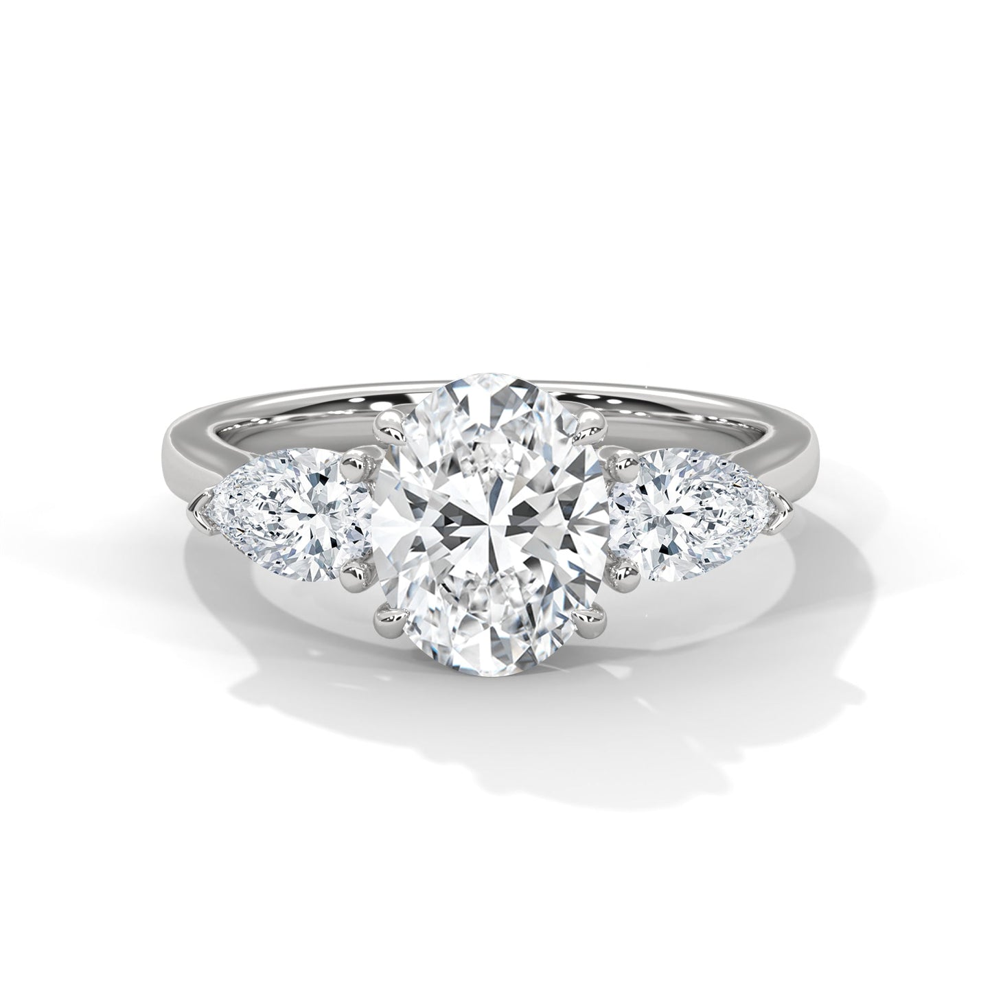 Three-Stone Lab-Grown Diamond Ring 1.5ct Oval with 1/2ct Pear Side Stones | 2.5 CTW